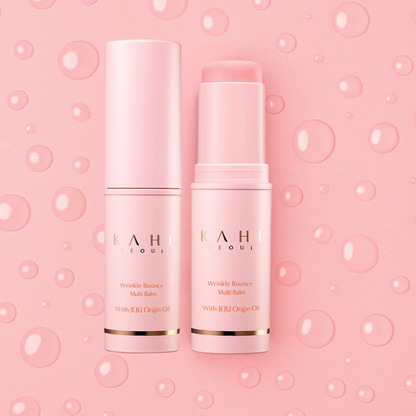 Two pink skincare products with 'KAH' branding on a pink bubble background